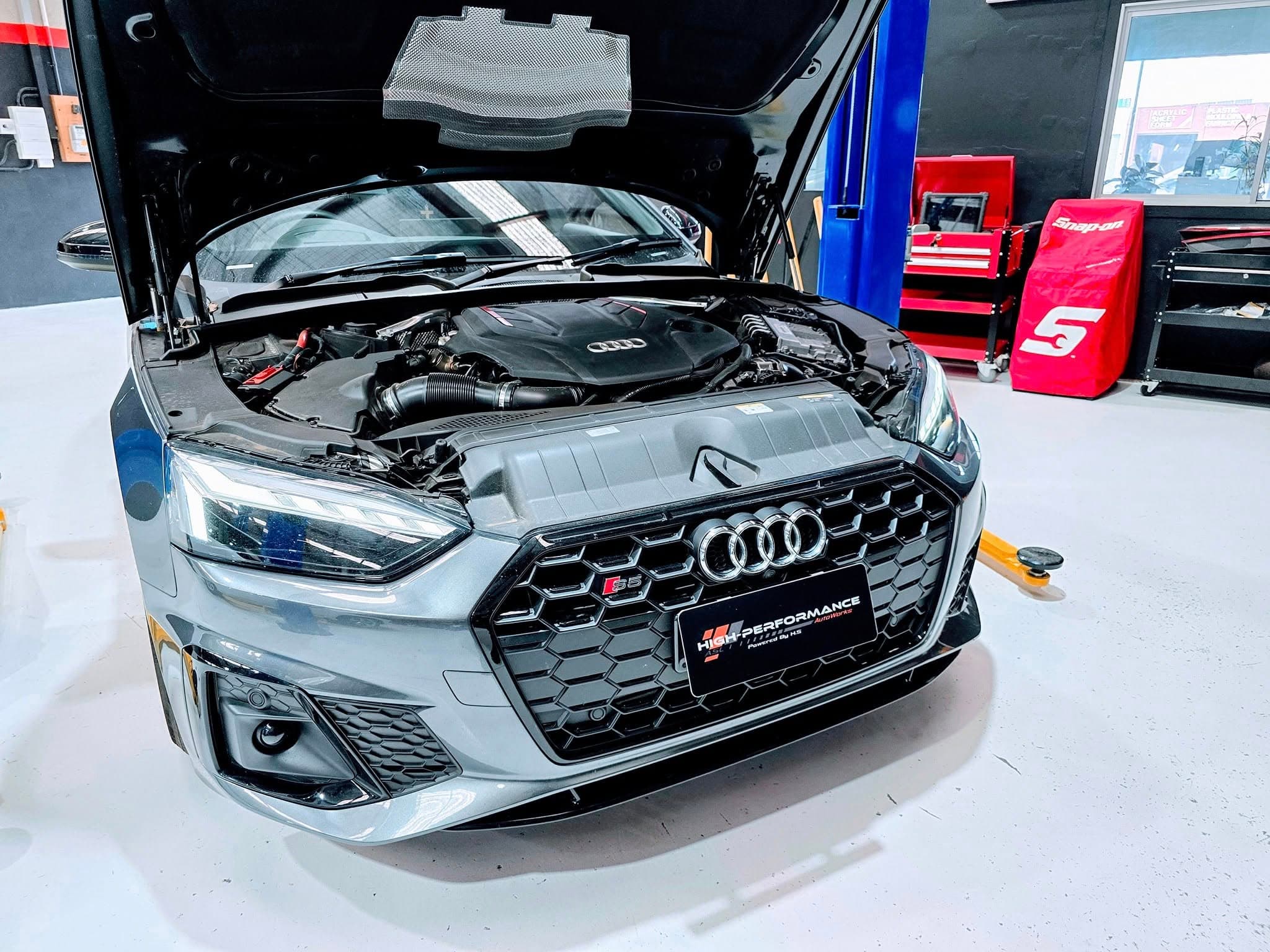 Audi engine bay during a workshop service